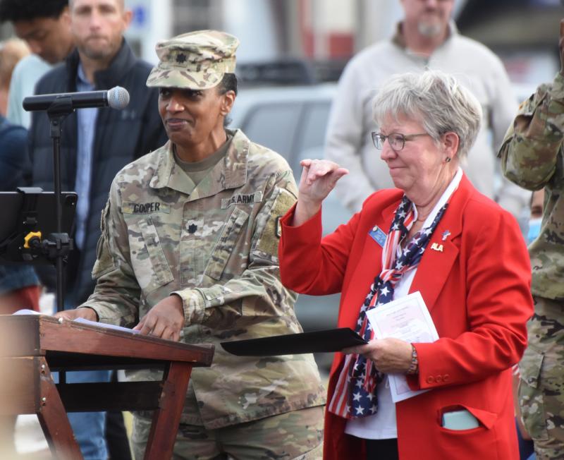 American Legion Auxiliary Unit 17’s Murt Foos says goodbye to the soldiers. Lt. Col. Synae Cooper stands to her right.