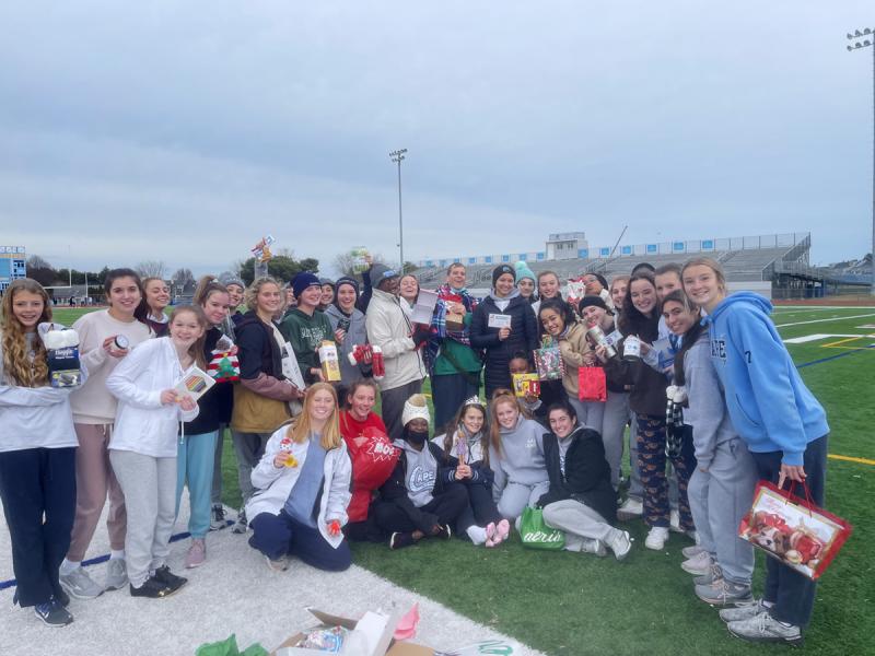 The Cape girls’ track team has some fun exchanging gifts for Christmas. SUBMITTED PHOTOS