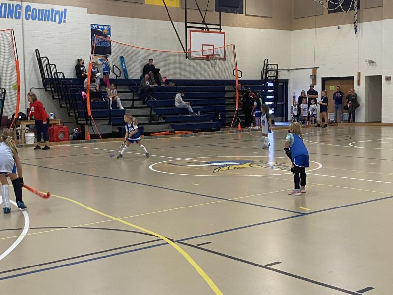 Alexa Hendrickson and Sam Swift working with their elementary Division Belmont team. Belmont Team