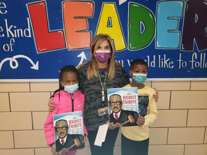 Shields Elementary Principal Kim Corbidge congratulates Moniya Cephas and Jermaine Miller for their recognition by the Southern Delaware Alliance for Racial Justice. SUBMITTED PHOTO