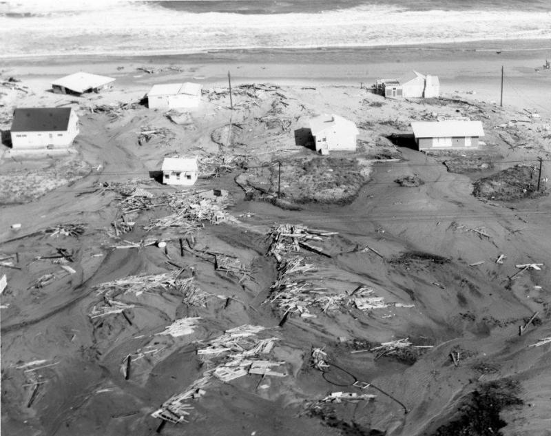 Houses are moved off their foundations and sand washes debris inland along Dewey Beach. DELAWARE PUBLIC ARCHIVES PHOTO