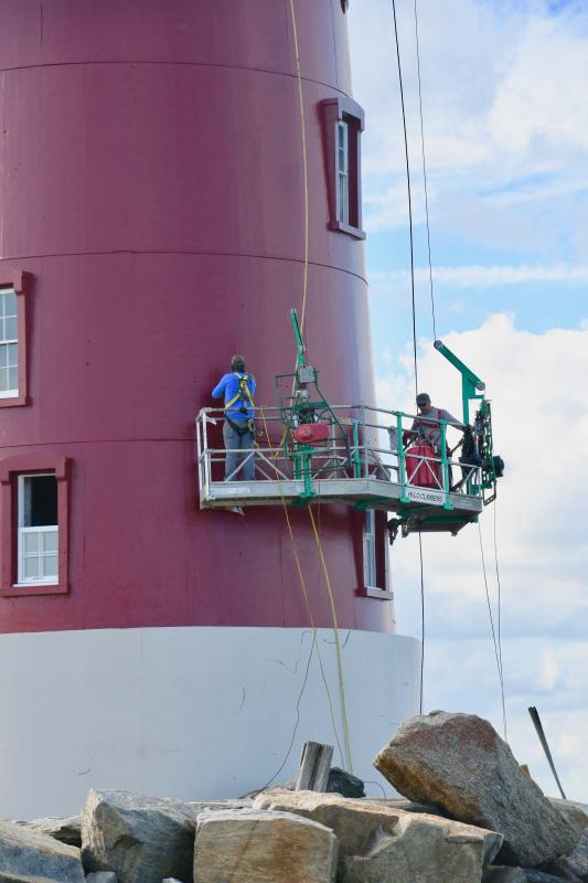 The breakwater lighthouse receives a fresh coat of paint during the summer and fall of 2020.