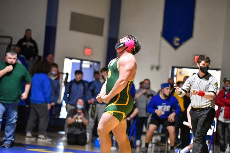 T.J. Burke (285) with a scream behind the mask. He carries an undefeated record into this weekend’s state tournament. DAVE FREDERICK PHOTO