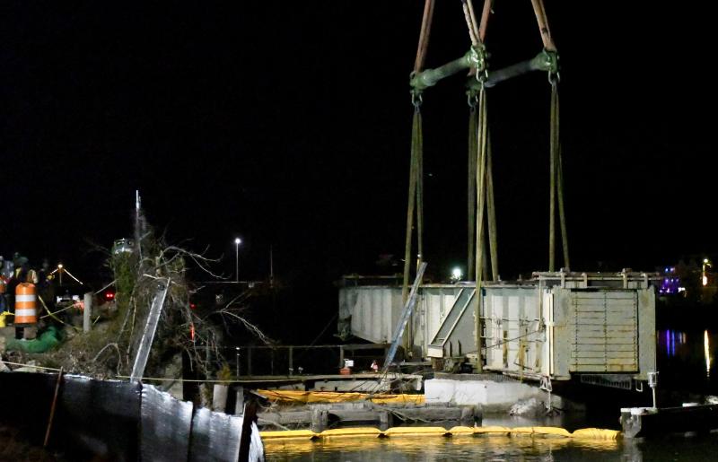 Work went into the night Dec. 1 until around 8 p.m., when it was determined the bridge was too heavy for the onsite crane to lift it safely.