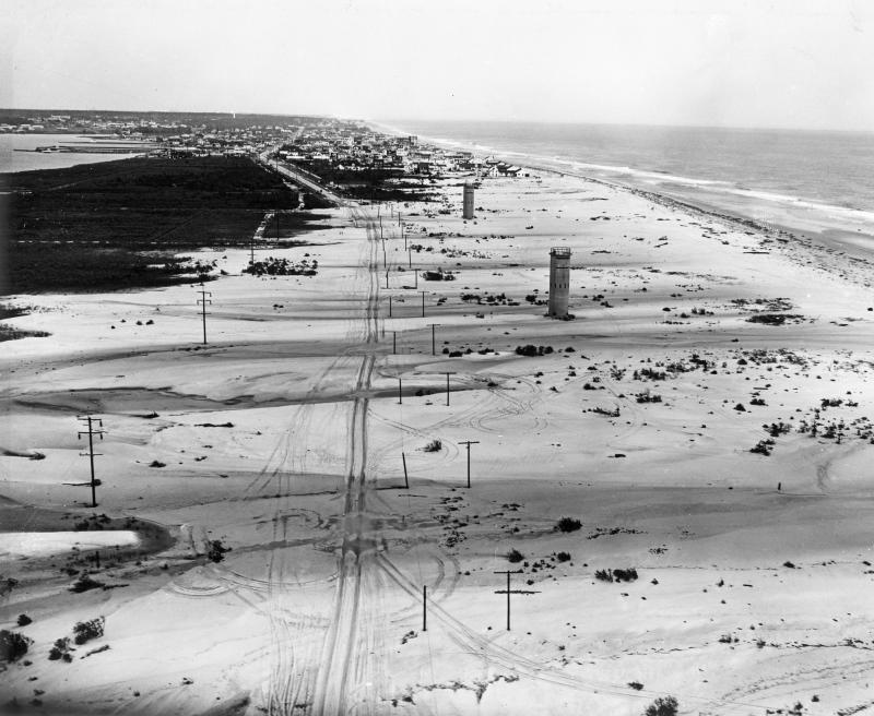 This aerial image looking north shows the nearly impassable stretch of road south of Dewey Beach. DELAWARE PUBLIC ARCHIVES PHOTO