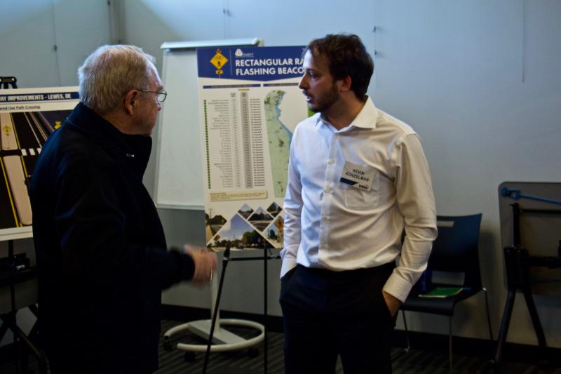 Lewes BPW President Preston Lee talks about the Canary Creek project with Whitman, Requardt and Associates representative Kevin Konzelman.