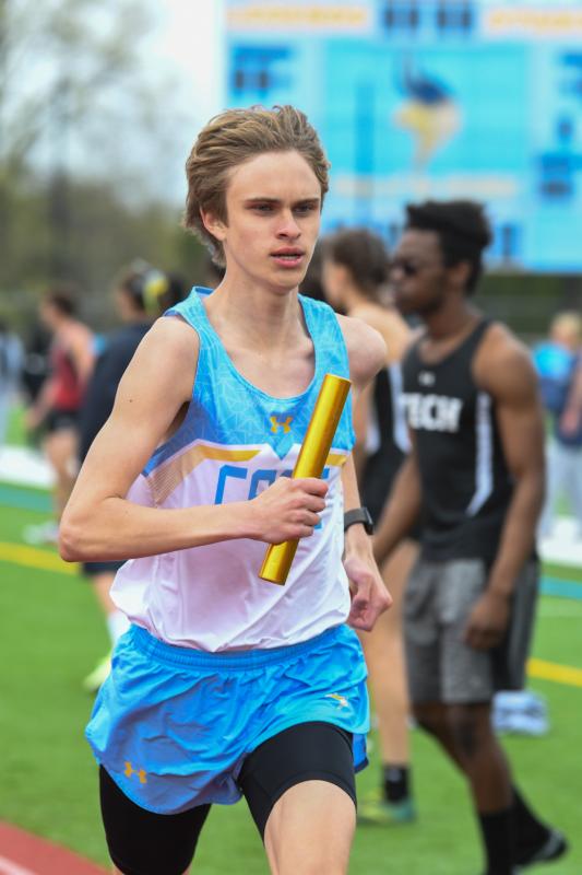 Ryan Baker runs the third leg of the 4-by-800 relay.