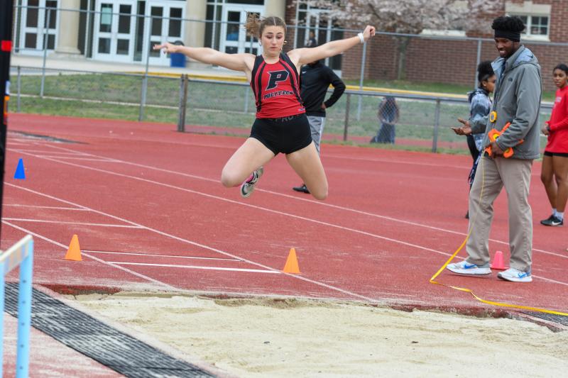 Lizzie Talamini-Kelemen of Polytech wins long jump with a distance of 16-3.