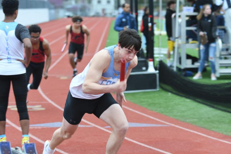 Cape’s Konner Knarr leads off the winning 4-by-100 relay team.