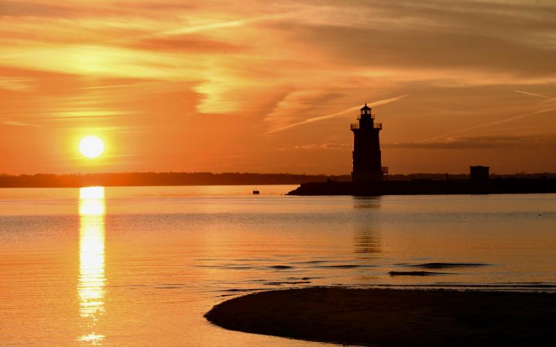 One of the most photographed scenes in Delaware is sunset on the Delaware Bay from the beach at Cape Henlopen State Park.