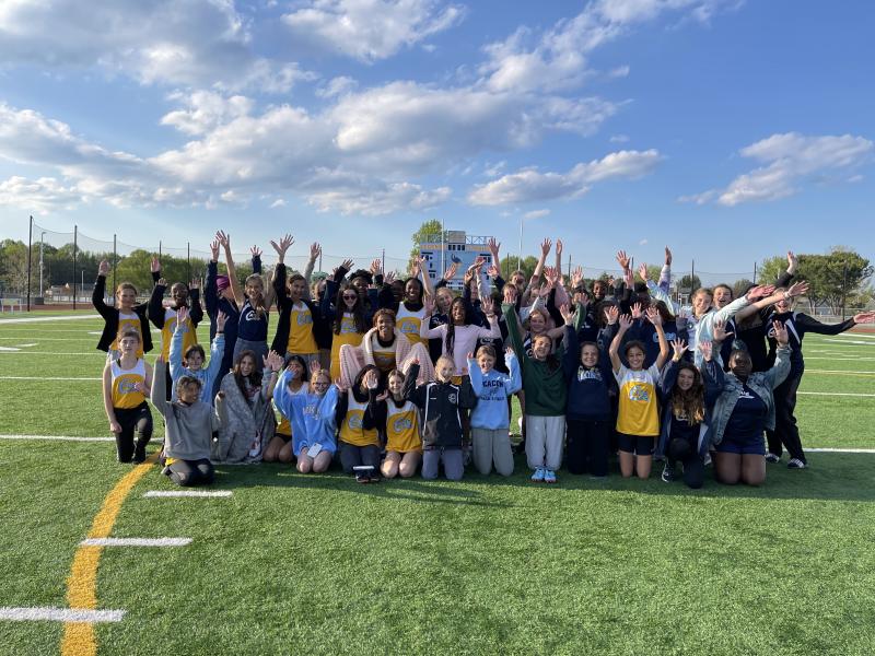 The Beacon and Mariner girls’ track and field teams get together after the high school coaches talked to them about becoming Vikings. SUBMITTED PHOTO