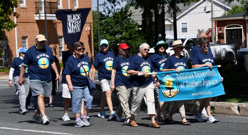 Members of the Unitarian Universalists of Southern Delaware, with a church on Route 9 west of Lewes, march in the parade.