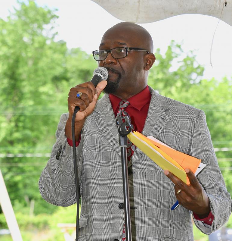 Ivan Neal, a former Richard Allen School student, serves as emcee.