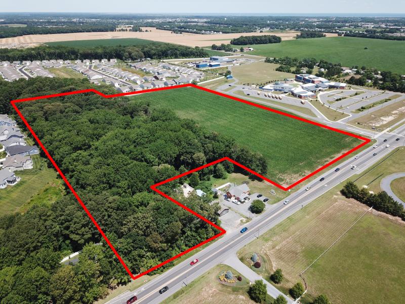 The 22-acre parcel for the proposed School Lane community along Route 24 west of Mulberry Knoll Road is outlined in red. In the rear is Four Seasons at Belle Terre and at right is Love Creek Elementary School. NICK ROTH PHOTO
