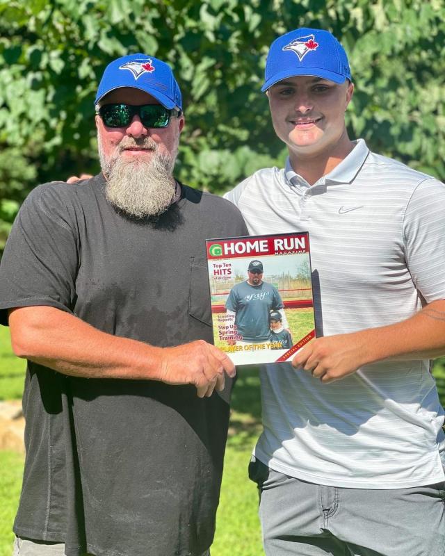 Lynn Fluharty, Cape Class of ’88, with son Mason Fluharty, shows a photo from their early days in Lewes Little League. KRISTY FLUHARTY PHOTO