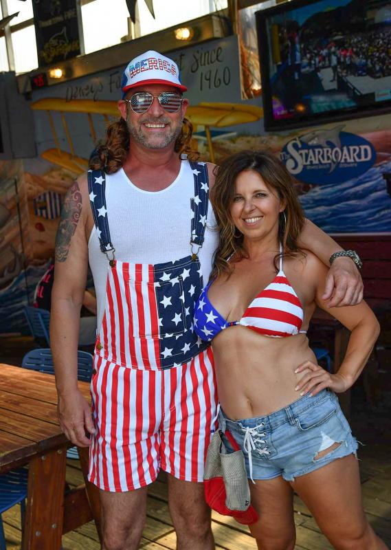 Justin Bennet, left, and Jen Hawk enjoy the Fourth at The Starboard.