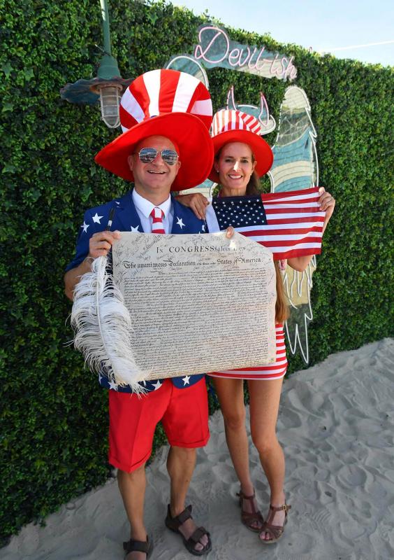 Ken Garfinkel, left, and Shandy Pumphrey show their constitution at Northbeach.