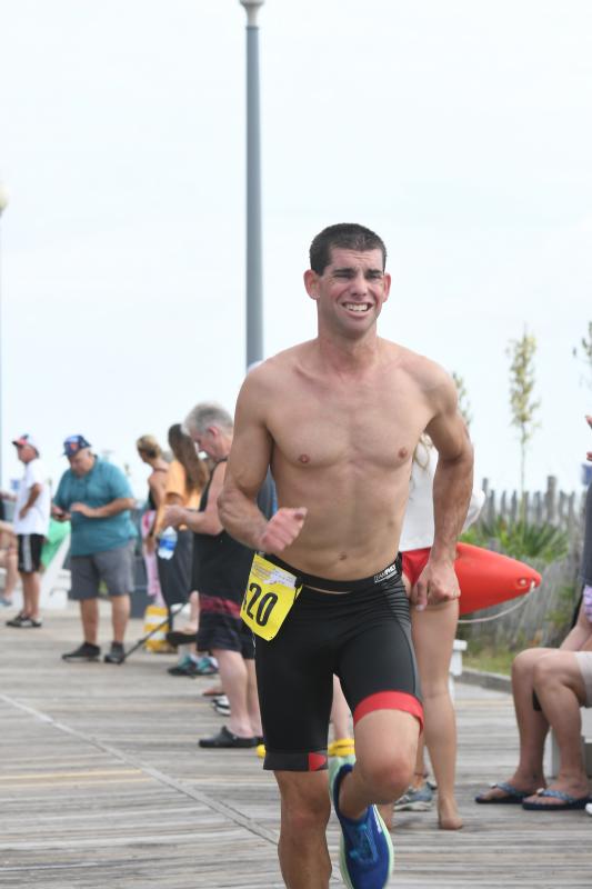 Matt Dunn crosses the finish line third.