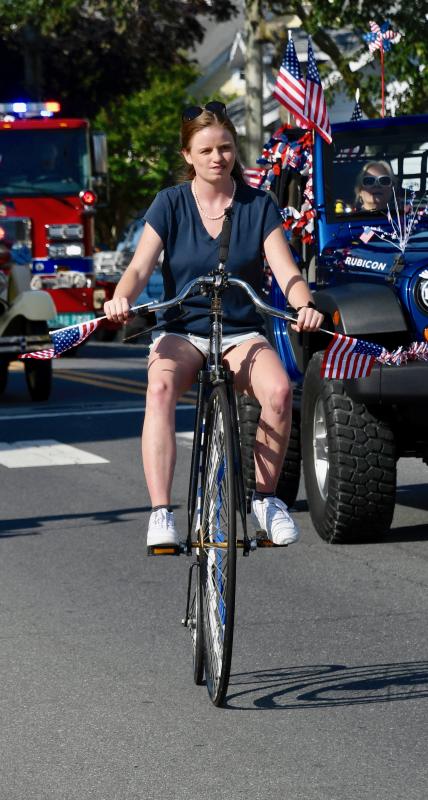 Kat Hartley of Lewes continues a family tradition of pedaling vintage bicycles in the parade.