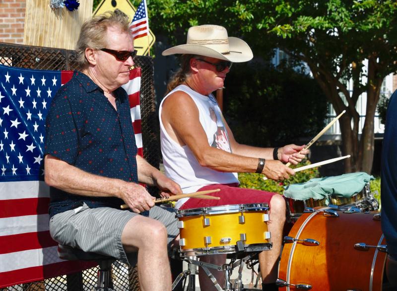 Ed and Mike Shockley join with family and friends to play patriotic songs along the parade route. The late Carolyn Shockley was one of the founders of the parade.