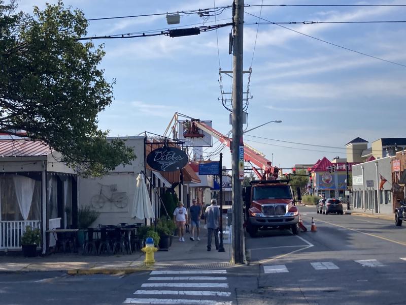 The signs were removed by a single boom truck. SUBMITTED PHOTO BY FRANK COLE
