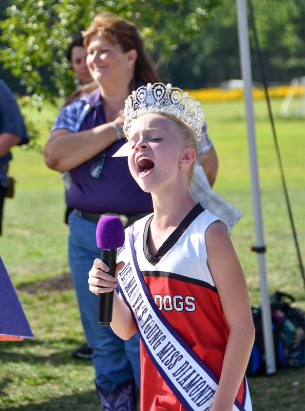 Delmarva’s Young Miss Diamond State Charli Evans, 9, sings the national anthem.