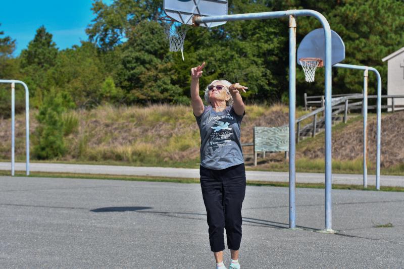 Grandma Sue drains a three-pointer. “This is my house!”