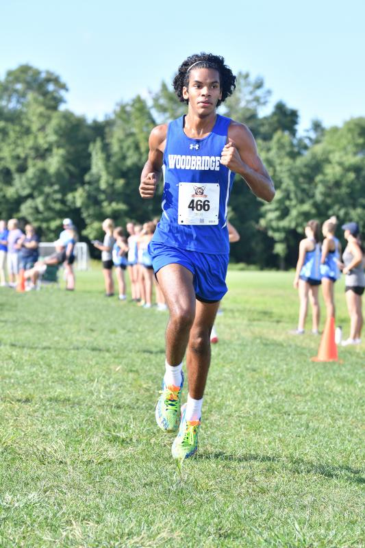 Ian Hayes of Woodbridge, a soccer and cross country athlete and honors student, runs to a time of 17:59.