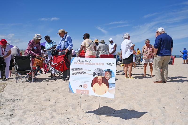 A crowd gathers at Johnnie Walker Beach in Lewes to celebrate the man behind the beach’s name. NICK ROTH PHOTOS