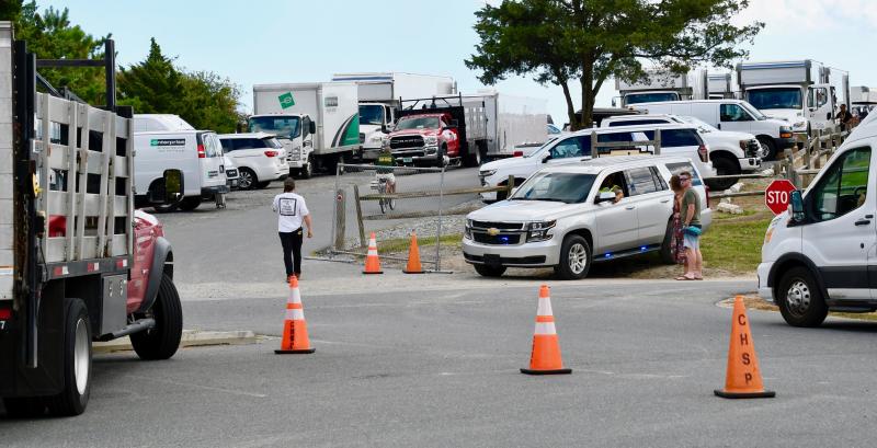 The Herring Point parking lot in Cape Henlopen State Park has been transformed into a film staging area. Filming is taking place on the beach below. RON MACARTHUR PHOTOS