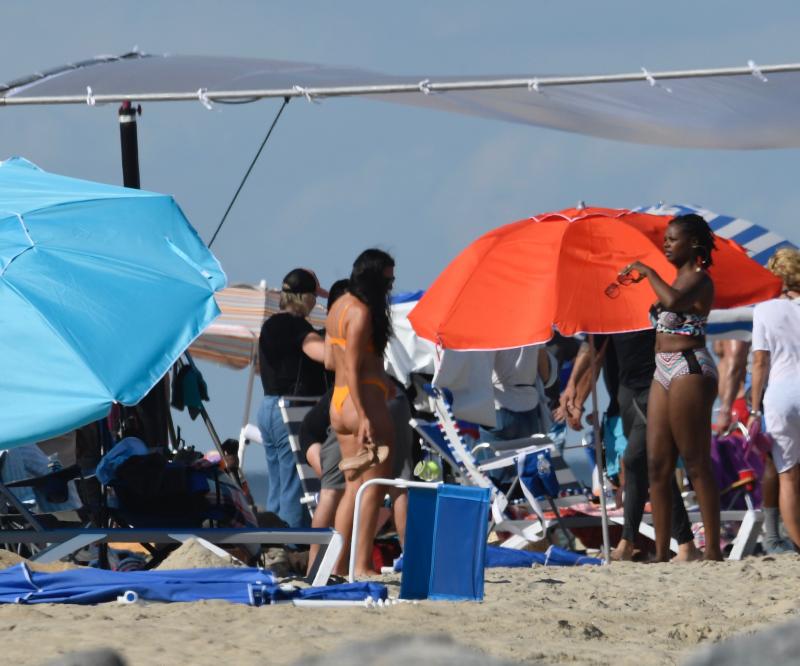 These are apparently some of the “beach body” extras being used in the filming.