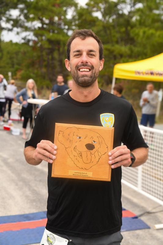 Bryan Mack, the Darby Dash winner, with a plaque designed and created by Half Stockley. DAVE FREDERICK PHOTO