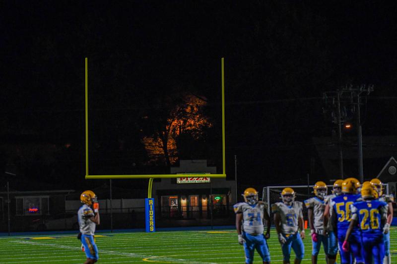 Homecoming Harvest Moon rises between uprights at Caesar Rodney. DAVE FREDERICK PHOTO