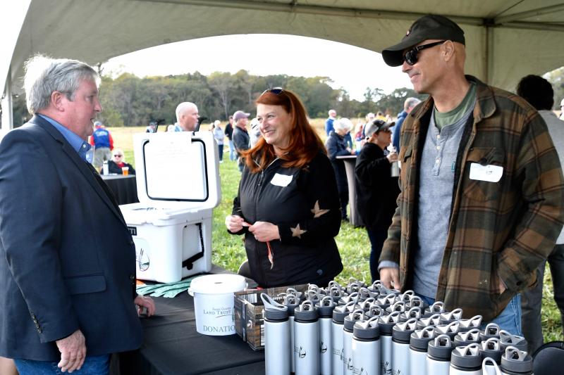 Sussex County Councilman John Rieley, left, talks with Heidi Gilmore, land trust chair. Rieley and fellow Councilman Mark Schaeffer serve as members of the board.