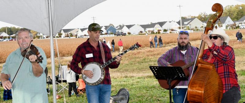 Homestead Bluegrass Band members (l-r) Steve Quillen, Casey Kenton, Shawn Rineholt and Dawn Thompson perform during the event. Kenton is past chairman of the land trust.