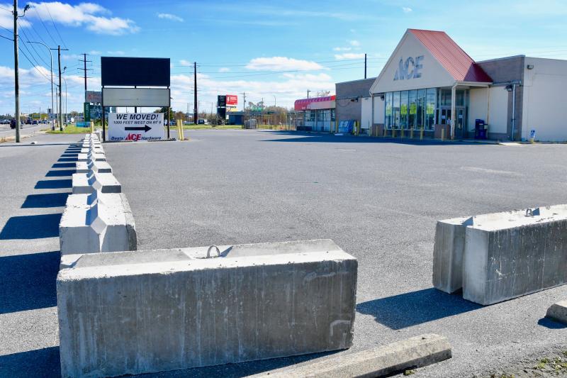 The former Bests’ Ace Hardware property near Five Points, now owned by DelDOT, is barricaded and the building is scheduled to be demolished in early 2023 to make way for road construction. RON MACARTHUR PHOTOS
