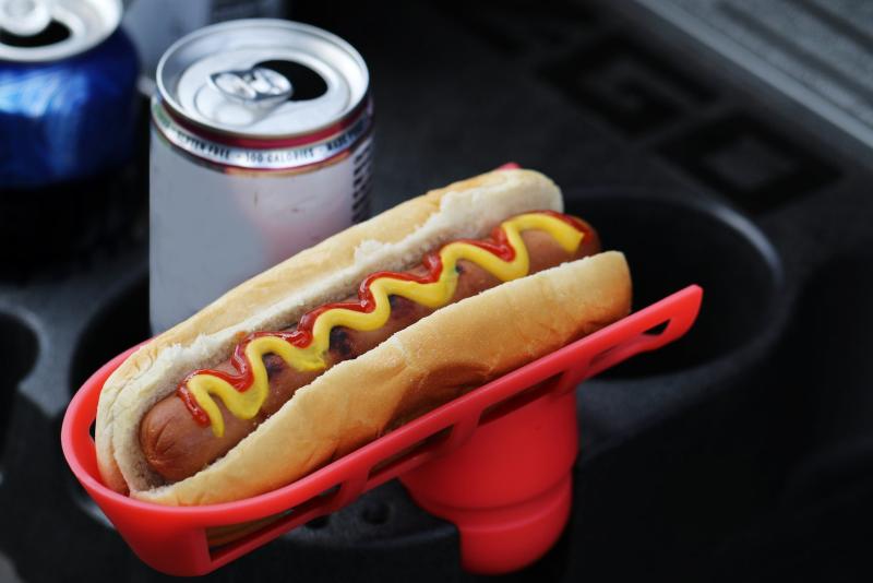 The Golf Cart Hotdog Holder is a good idea, but it has one design flaw. Watch out when the cart is actually moving. SOURCE: ETSY