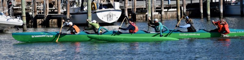 With coach David Schofield steering, New Hope Canoe Club members make a turn to paddle in the Lewes-Rehoboth Canal toward the Broadkill River.