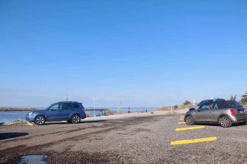 Upgrades in 2022 to the Roosevelt Inlet parking lot, including delineated parking spaces, were meant to help with parking on Lewes Beach. AARON MUSHRUSH PHOTO
