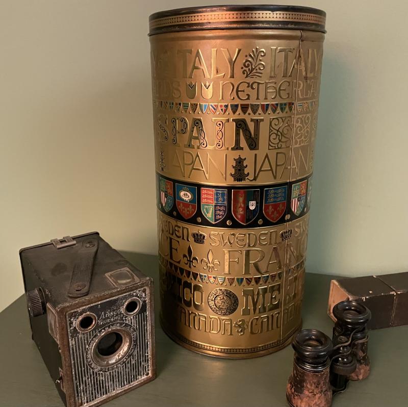 Elsie Daisey Draine left behind a gold-colored can of family photographs.