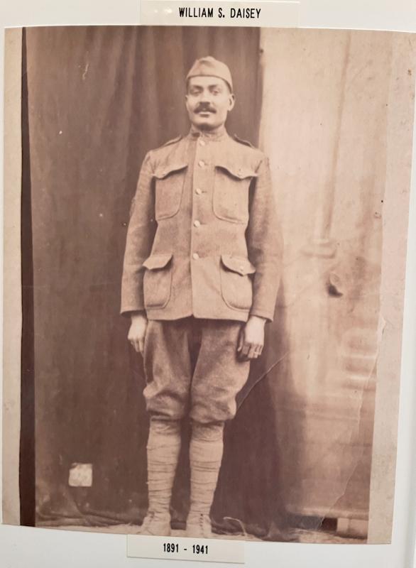 A family photograph from 1918 shows William in his military uniform adorned with a service medal from World War I.