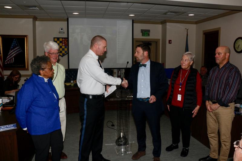 Lewes Fire Chief Aidan Gause accepts the yearly donation Lewes Mayor and City Council give to the volunteer department on behalf of the City of Lewes. Fire departments rely on donations and fundraising for a large portion of their funding.