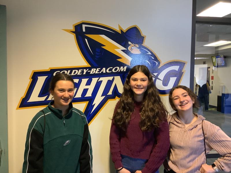 Stopping for a photo with the Lightning, the Goldey-Beacom College mascot, are Beacon AVID students (l-r) Summer Fusco, Ashlynn Panyko and Bella Cross. SUBMITTED PHOTOS