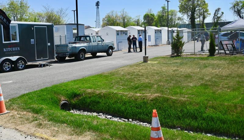 Work continues on the grounds of the homeless village including upgrades and landscaping at the entrance. Plans are also in the works for construction of a community building.