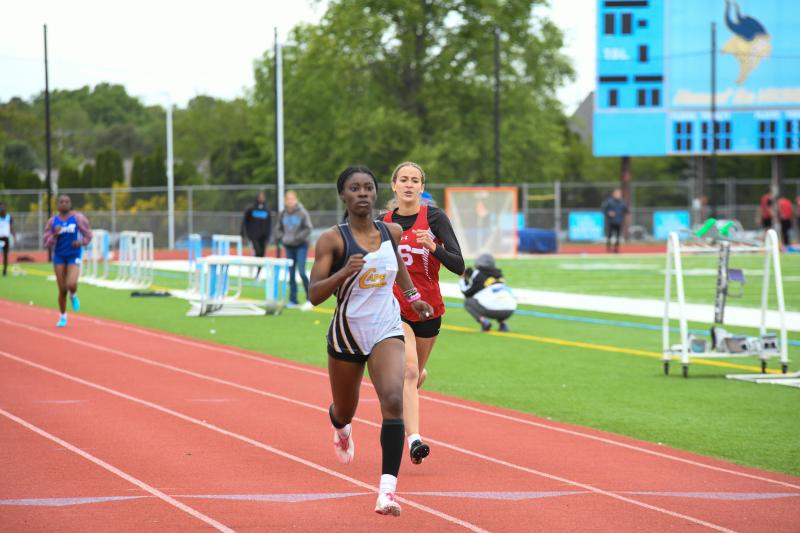 Kennedy Johnson wins the 400-meter run. DAVE FREDERICK PHOTOS