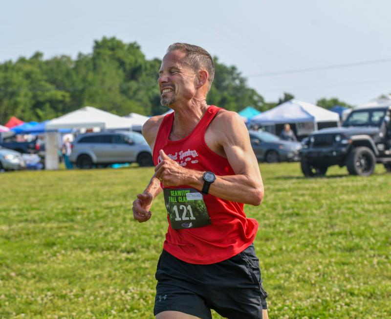 Mike Sewell wins the Uncorked 5K at Hudson Fields.