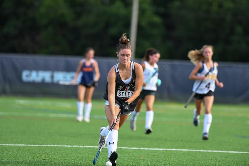 Lulu Rishko moves up the field at open fields. DAVE FREDERICK PHOTOS