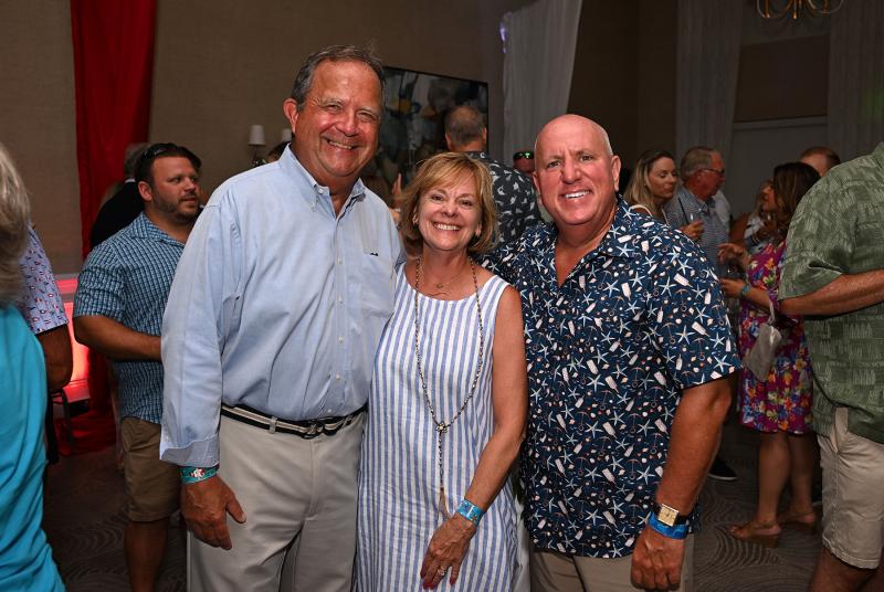 Tom and Joanna Brown, left, share a moment with Beebe Medical Foundation President Tom Protack.