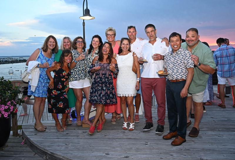Enjoying the Beebe Bash on the deck of the Lighthouse Cove are (l-r) Kelly Fanto, Joy Sabbagh, Rose Furio, Justine Donahue, Lisa Kwan, Hiba Stancofski, Liz Zehner, Roxanne Sordi, Dr. Mark Sordi, Dr. Erik Stancofski, Dr. Delbert Kwan and Dr. Ron Sabbagh. DAN COOK PHOTOS