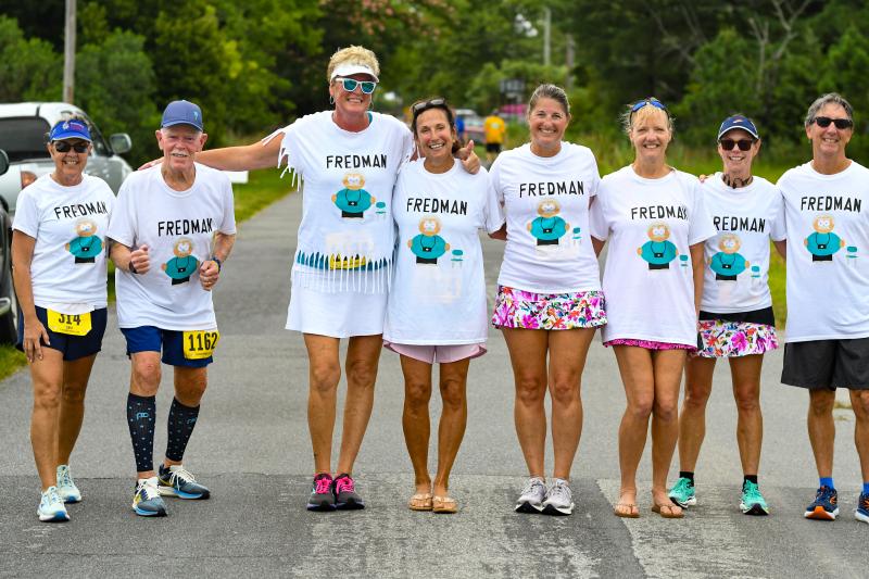 Fredman shirts show up at the Beebe Heroes 5K finish in Lewes. Shown are (l-r) Cindy Redefer, Jack Vassalotti, Liz Zehner, Ava Cannon, Molly Sewell, Lori Holdsworth, Joanne Woodruff and Bill Holdswoth. DAVE FREDERICK PHOTOS